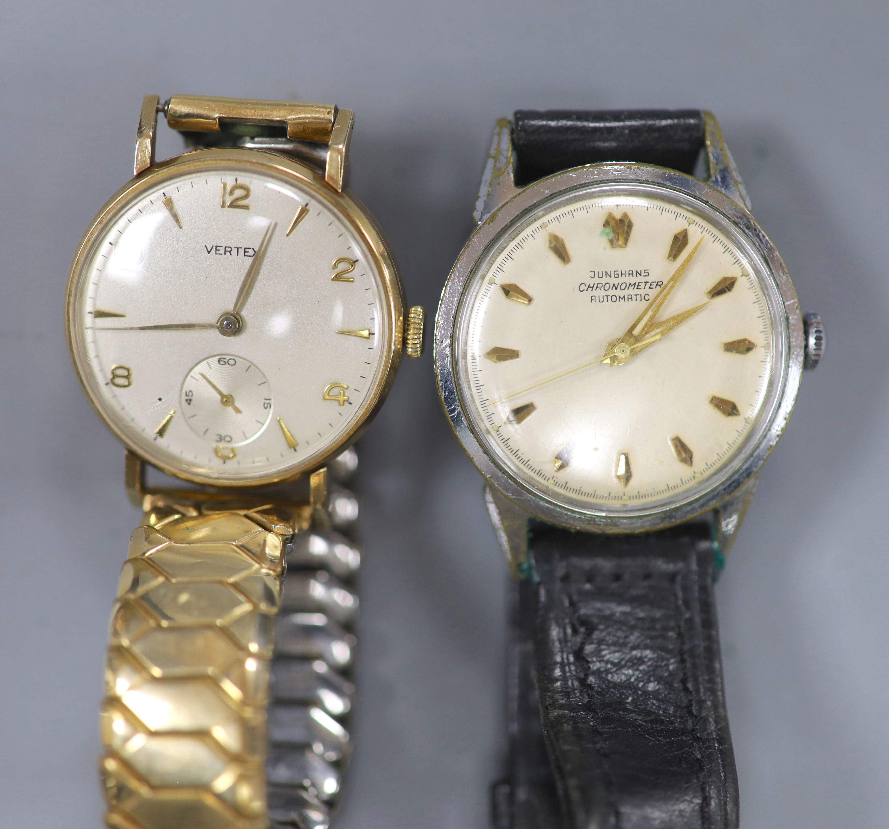 A gentlemans 9ct gold Vertex manual wind wrist watch, with case back inscription & a Junghans steel watch.
